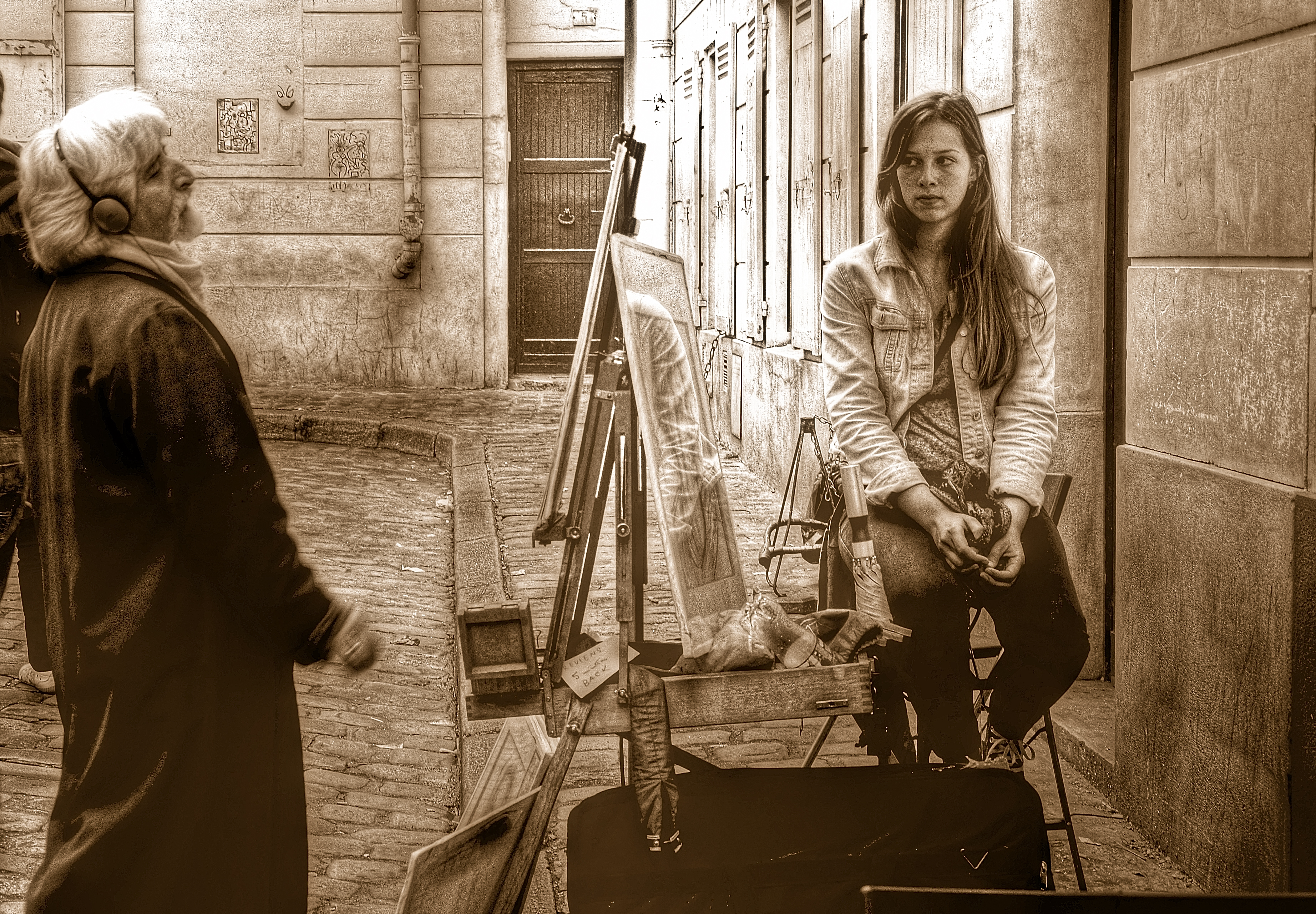 Un pintor y su modelo, en Montmarte.